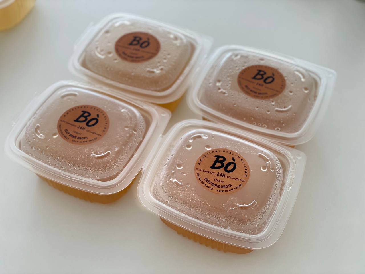 Four Bò containers showing consistent gelatinous quality